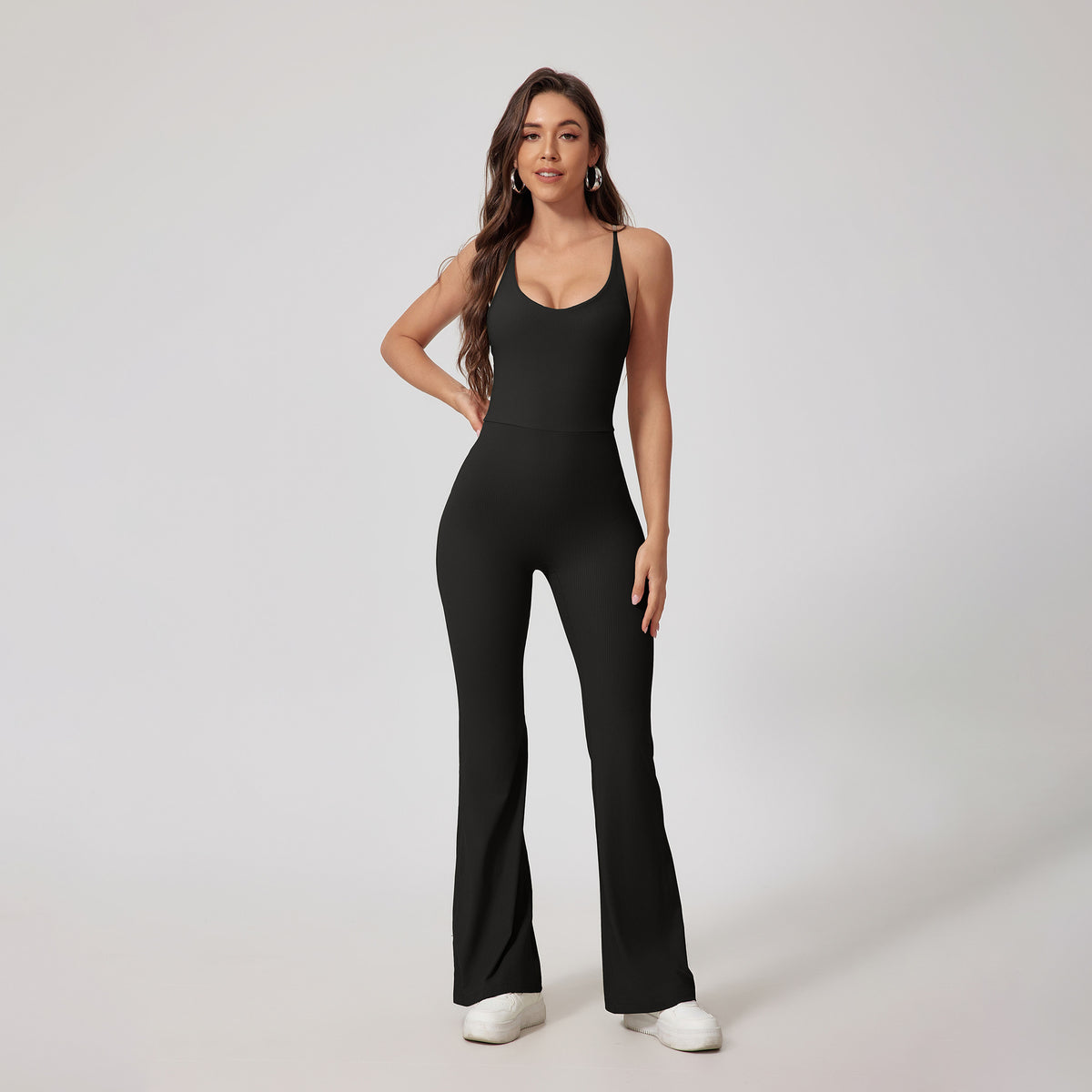 Strappy Open-Back Sports Jumpsuit — Flared Leg & Sculpting Fit