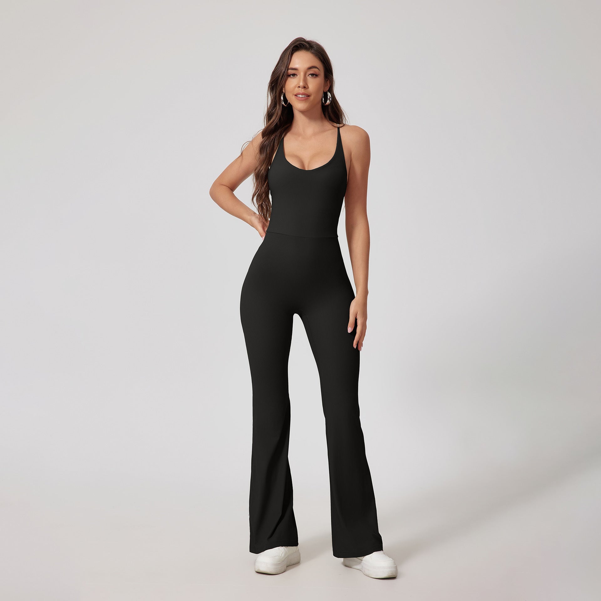 Strappy Open-Back Sports Jumpsuit — Flared Leg & Sculpting Fit