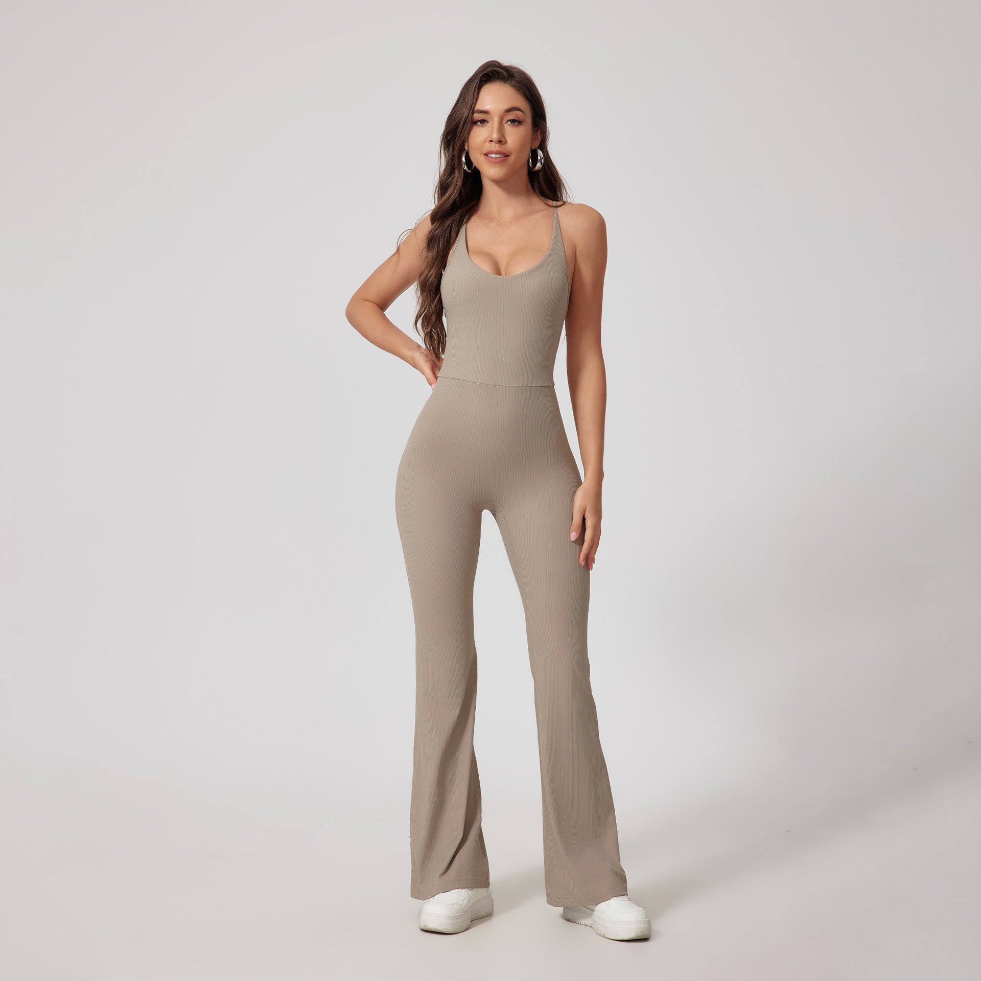 Strappy Open-Back Sports Jumpsuit — Flared Leg & Sculpting Fit
